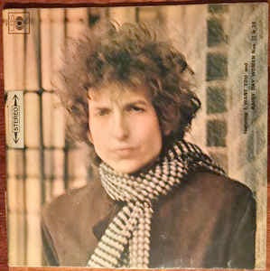 Image of Front Cover of 2xLP - VG/VG+ - BOB DYLAN, Blonde on Blonde (CBS Smooth Orange (33 1/3 On Label); 66012, UK 1974 Reissue, Laminated Gatefold, No Flipback, Stereo 2nd Issue w/9 Photos, B2: "Stuck In Mobile With Thee" on sleeve. "Memphis Blues Again" on label. "Bob Dylan" above "Blonde On Blonde" and 'Record 1' / 'Record 2' on the record labels.), Strong VG cover with minor edge wear., Sleeve:No 'Stereo' logo on front and no logos on back.66012 on spine and above CBS logo on frontInside gatefold 9 