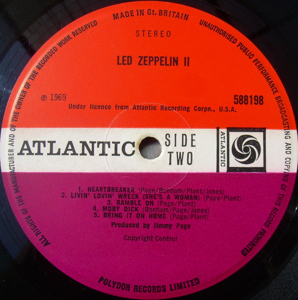 Image of Label of 3544179S: LP - LED ZEPPELIN, II (Atlantic Plum & Orange; 588 198, UK 1969, Gatefold, No Stereo on Front Sleeve, Livin Lovin Wreck Misprint) Sleeve has edge and ring wear but is intact at all edges. Strong spine. Initials written above Zep logo. Disc is covered in hairlines but no deep marks.   G+/G+