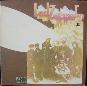 Image of Front Cover of 3544179S: LP - LED ZEPPELIN, II (Atlantic Plum & Orange; 588 198, UK 1969, Gatefold, No Stereo on Front Sleeve, Livin Lovin Wreck Misprint) Sleeve has edge and ring wear but is intact at all edges. Strong spine. Initials written above Zep logo. Disc is covered in hairlines but no deep marks.   G+/G+