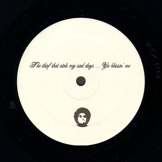 Image of Front Cover of 12" - /VG - MOODYMANN, The Thief That Stole My Sad Days... Ya Blessin' Me (KDJ; KDJ 23A/23B,  2004, Plain Sleeve), Black marker on label., A1	(Moodymann Logo)	A2	Your Sweet Lovin	B	Untitled - 3816127C