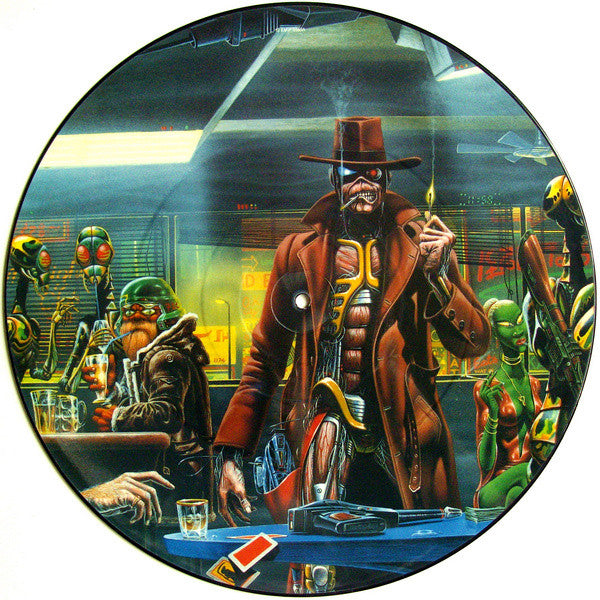Image of Front Cover of 12" - /G+ - IRON MAIDEN, Stranger In A Strange Land (EMI; 12EMI5589, UK 1986, Picture Disc), Original plastic sleeve grubby and tatty.  Hairlines over record but picture intact. ,  - 2326337E