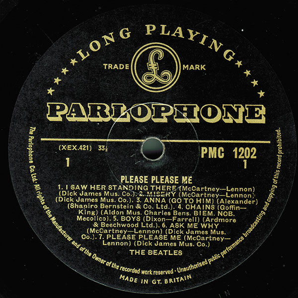 Image of Label Cover of 4644145S: LP - THE BEATLES, Please Please Me (Parlophone Black/Gold; PMC 1202, UK 1963, Flipback EJ Day, Mono - Dick James Publishing, Aligned Photo - XEX421-1, XEX422-1N.) Sleeve intact all around but  taped along bottom edge, has some moisture damage/staining to rear. The front is good with a light corner crease and a strong, readable spine. A1 is noisy and skips, but rest of the record plays G/G+ with light surface noise throughout. Both sides of disc have long light marks with  s