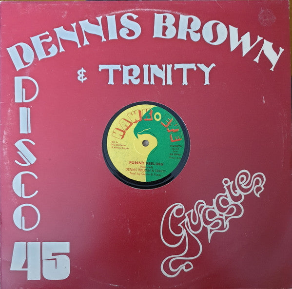 Image of Label Cover of 12" - VG/G+ - DENNIS BROWN & TRINITY, Funny Feeling / To The Foundation (Hawkeye; HD 007, UK 1978, Hawkeye Company Sleeve), Light marks ony, but plays with a bit of background throughout. Clean labels, in company sleeve.,  - 2446103S