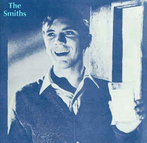 Image of Front Cover of 12" - VG/VG+ - THE SMITHS, What Difference Does It Make? (Rough Trade Non-Cursive Logo; RTT 146, UK 1984, Terrence Stamp & Band Name Sleeve, 3rd Pressing), Edge wear, some scratching to rear of sleeve.,  - 2816315C