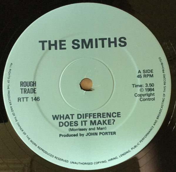 Image of Label Cover of 12" - VG/VG+ - THE SMITHS, What Difference Does It Make? (Rough Trade Non-Cursive Logo; RTT 146, UK 1984, Terrence Stamp & Band Name Sleeve, 3rd Pressing), Edge wear, some scratching to rear of sleeve.,  - 2816315C