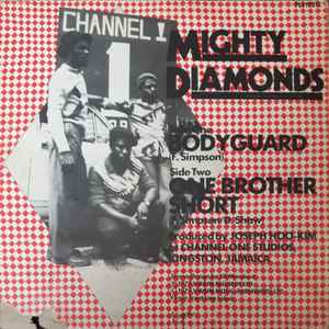 Image of Back Cover of 4914431C: 12" - THE MIGHTY DIAMONDS, Bodyguard / One Brother Short (Front Line; FLS12212, UK 1979, Company Sleeve) Stock copy. Visible scuff on side B, nap. Sleeve is EX.  EX/VG+