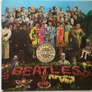 Image of Front Cover of 3144094S: LP - THE BEATLES, Sgt. Pepper's Lonely Hearts Club Band (Parlophone Silver / Black, 1 EMI Box; PCS7027, UK 1969 Reissue, Laminated Gatefold, Flipback Inside.Patents pending on rear , Insert, Stereo) Strong VG, Sleeve has a chewed up spine towards the top hence the G+, Otherwise clean and intact, Includes insert  G+/VG