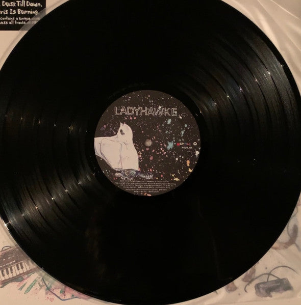 Image of Label Cover of LP - VG+/G+ - LADYHAWKE, Ladyhawke (Modular; MODVL104, UK 2008, Gatefold, Booklet), Clean sleeve with promo sticker over barcode. Disc has light marks and hairlines only. ,  - 0816466C