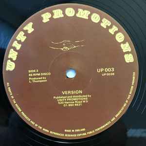 Image of Back Cover of 12" - /G+ - ROD TAYLOR & RANKING KING, Moving Out Ever (Unity Promotions; UP 003, UK 1981, Plain Sleeve), Lots of mottling on disc but plays well.,  - 3326138E