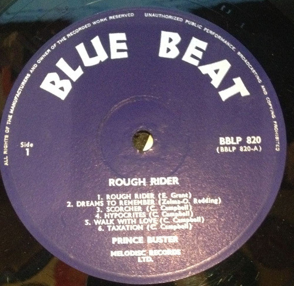 Image of Label Cover of LP - VG/G+ - PRINCE BUSTER, She Was A Rough Rider (Blue Beat; BBLP 820, UK 1969, Laminated Front Sleeve), Marks and scuffs, plays through ok and retains a lot of sheen. Light wear on sleeve.,  - 1345112S