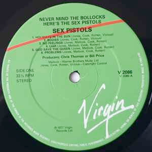 Image of Label Cover of LP - G/VG - SEX PISTOLS, Never Mind the Bollocks (Virgin Red/Green; V 2086, UK 1978 Reissue, 7th Press. "Belsen..." & "Liar"(Twice) Listed On Rear), Sticker And Water Damage To Sleeve, Split Spine, Writing On Front And Rear,  - 3426069E