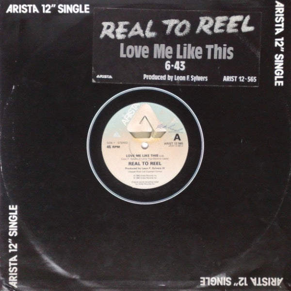 Image of Front Cover of 4114339C: 12" - REAL TO REEL, Love Me Like This (Arista; ARIST12565, UK 1983, Stickered Company Sleeve) Sleeve slightly bent at bottom  VG/VG