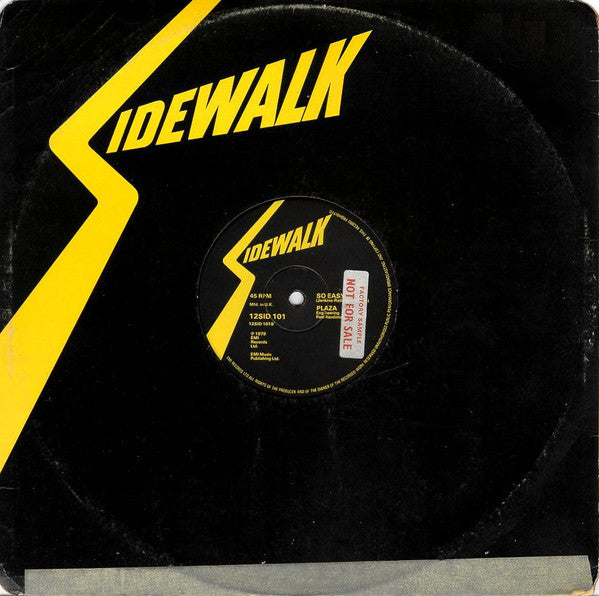 Image of Front Cover of 12" - VG/VG+ - PLAZA, (Got My) Dancing Shoes / So Easy (Sidewalk; 12 SID 101, UK 1979, Company Sleeve), Light marks on vinyl. Plays well. Light evidence of previous price sticker on company sleeve. Light ringwear.,  - 1826135E