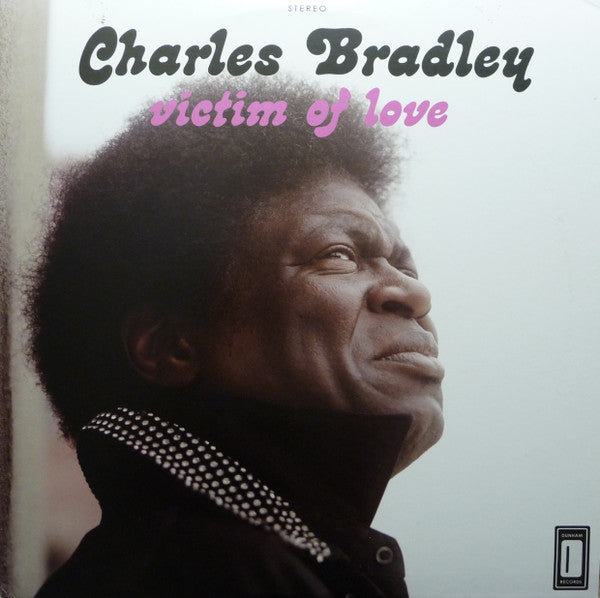 Image of Front Cover of LP - NEW/NEW - CHARLES BRADLEY, Victim Of Love (Daptone; DAP031LP, UK 2013, Download Code), , Bradley and writer/producer/multi-instrumentalist Thomas "TNT" Brenneck returned to Dunham studios and recorded the most exciting Daptone release to date, Victim of Love. On this album, Bradley moves past his "Heartaches and Pain" to the great promise of hope and love. Though quite at home among the music that has affirmed Daptone as the world's #1 authority on Soul Music, Victim of Love pro