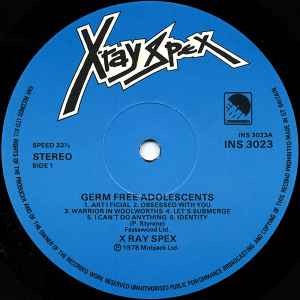Image of Label Cover of LP - VG/G+ - X-RAY SPEX, Germfree Adolescents (EMI International; INS 3023, UK 1978, Laminated Sleeve, Inner), Hairlines.  Small patch of sticker damage on sleeve front. ,  - 3626513E