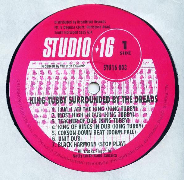 Image of Label Cover of LP - NEW/NEW - KING TUBBY, Surrounded By the Dreads at the National Arena 26th September 1975 (Studio 16; STU16LP 003, UK Reissue), , On the 26th September 1975 at the National Arena, Kingston, Jamaica, King Tubby's sound system entertained the excited audience gathered there to listen to the almighty live sound of the Wailers on stage and the overpowering dub music that Tubby has made world famous. On this particular night Tubby proved that he was King playing from 6pm to 6am. King 