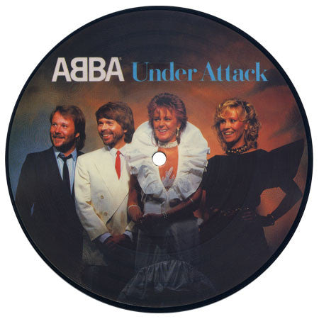 Image of Front Cover of 7" - VG+/VG+ - ABBA, Under Attack / You Owe Me One (Epic; EPC A 11-2971, UK 1982, Clear Plastic Sleeve, Picture Disc), Strong VG+, Sleeve Creased,  - 0926398E