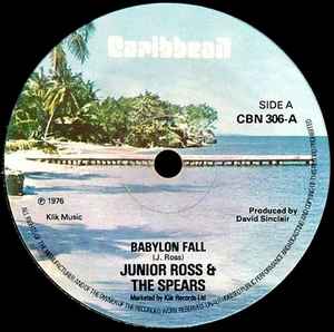Image of Front Cover of 7" - /VG - JUNIOR ROSS & THE SPEARS, Babylon Fall (Caribbean; CBN 306, UK 1976), Lighter marks generally. Large patch of damage and large marker pen writing on labels,  - 2416287C