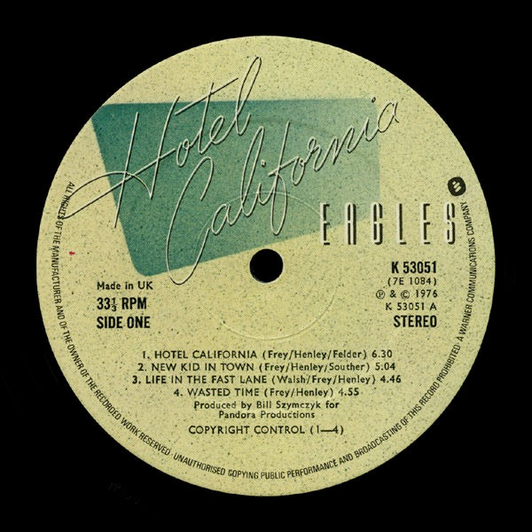 Image of Label Cover of LP - VG/VG - EAGLES, Hotel California (Asylum Custom Label; K 53051, UK 1976, Gatefold, Inner, Poster), Strong VG throughout, Lightest of hairlines, Just a few spots of wear to sleeve edges. ,  - 3916357C