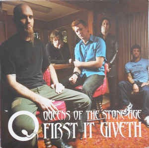 Image of Front Cover of 7" - VG/VG - QUEENS OF THE STONE AGE, First It Giveth (Interscope Records; 981 050-6, Europe 2003, Red Vinyl), Vinyl is fogged on Side B. Sleeve has lots of edge wear.,  - 4216032C
