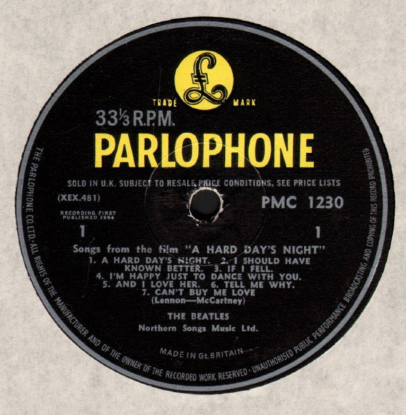 Image of Label of 5113159C: LP - THE BEATLES, A Hard Day's Night (Parlophone Black/Yellow; PMC1230, UK 1964, Laminated Flipback G&L Sleeve, Mono - 1st Press. Wide Font Cat No on label, K/T Tax Code) Tape Damage To Sleeve  VG/G