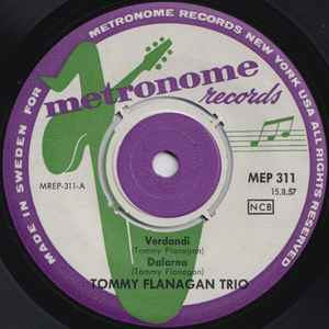 Image of Label of 0124152E: 7" EP - TOMMY FLANAGAN TRIO, Tommy Flanagan Trio (Metronome; MEP 311, Scandinavia 1957, Pasteback Sleeve) Light marks but plays well. Strong G+. Light wear to sleeve with some markings on top of some text on reverse.  VG/G+